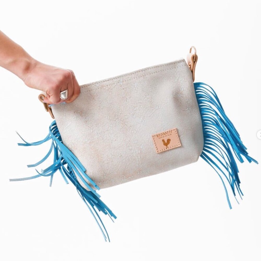 Combination sling/strap and clutch bag